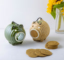 Mini pig incense holders.