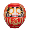 Red daruma.