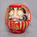 Red daruma doll.