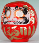 Red daruma doll from Japan.