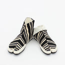 Stripe Tabi.