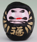 Black daruma.