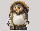 Tanuki with walking stick.