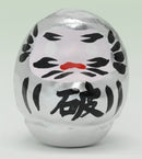 Silver daruma.