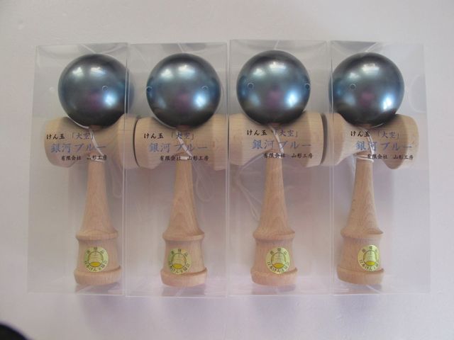 Kendama cases in clear plastic.