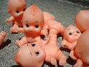 Sitting Kewpie (set of 10).
