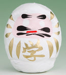 White daruma doll.